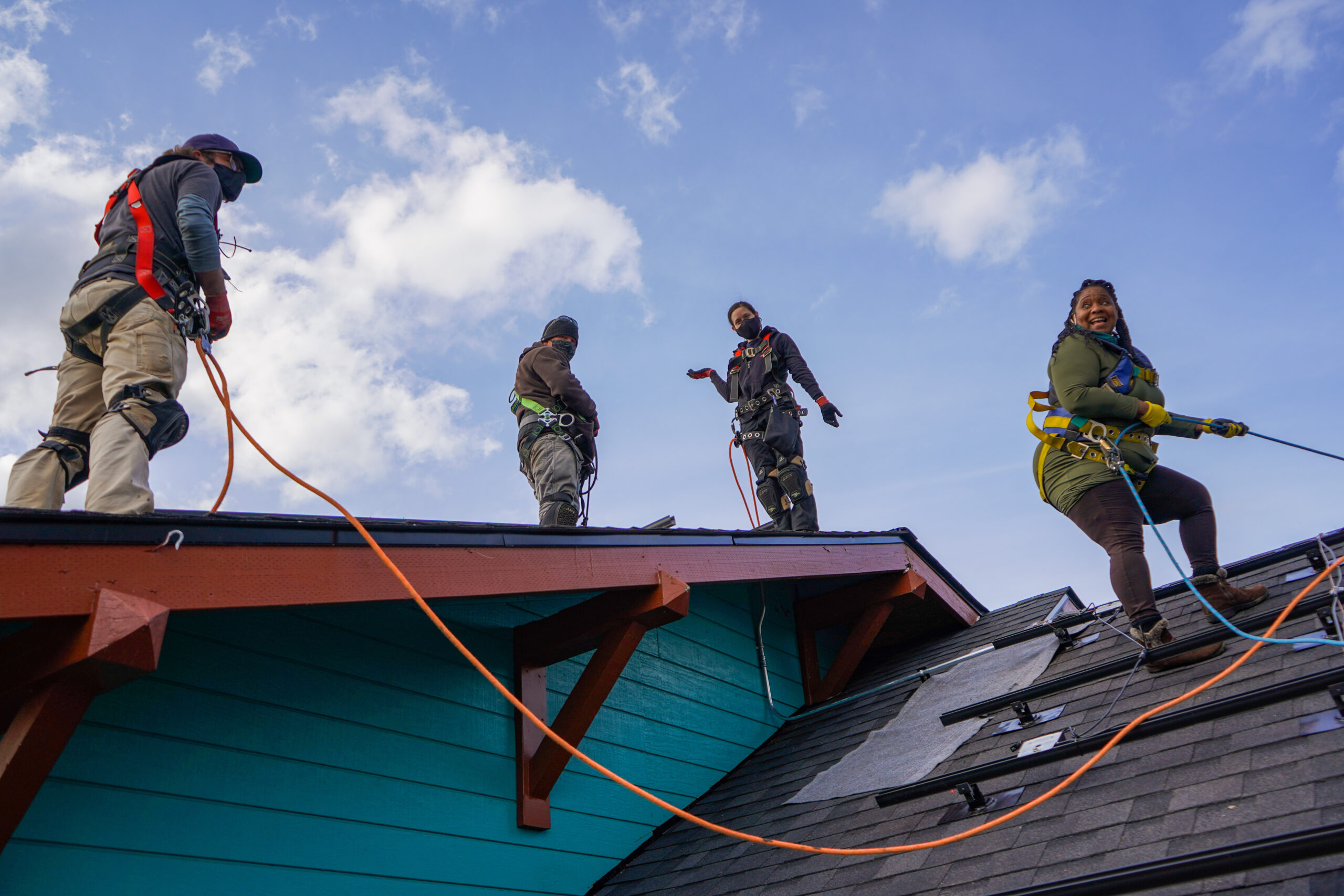 Shawna and the South Sound Solar crew on the Media Island roof.